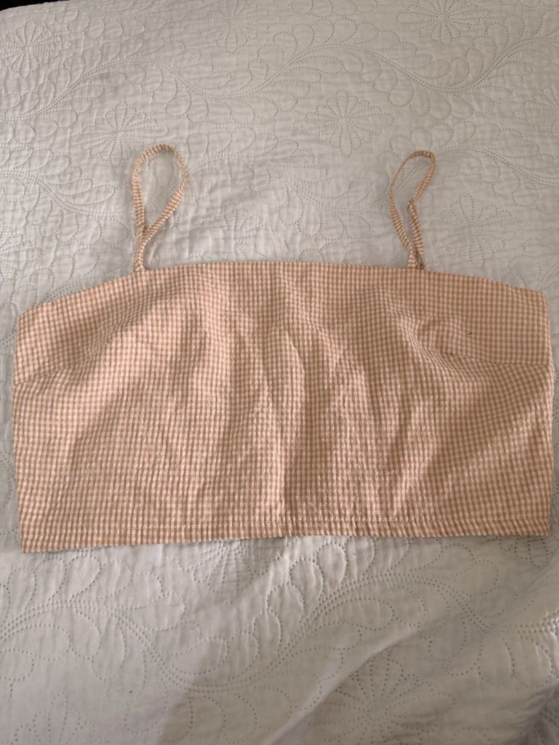 GTW Urban Gingham Checkered Crop Top with Zip Back (Category: Sleeveless) located in Manila. Submitted by cassieuuu (Listing ID 1466993375, Image 1). Description: - Style: Orange and white gingham crop top - Design: Sleeveless with thin spaghetti straps and straight neckline - Detail: Exposed silver zipper along the back .