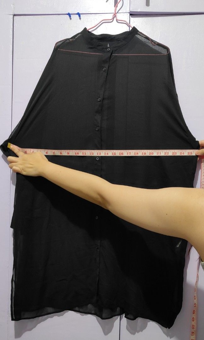 GU Black sheer button down tunic oversized long sleeve shirt (Category: Longsleeves) located in Bacolor. Submitted by annjjjjj (Listing ID 1467105262, Image 2). Description: - Color: Black - Style: Sheer button-down shirt with mandarin collar and long tunic length - Fit: Oversized, relaxed, and lightweight - Sleeves: Long sleeves with cuffs - Versatility: Perfect for layering over tops or dresses, easily styled up or down.