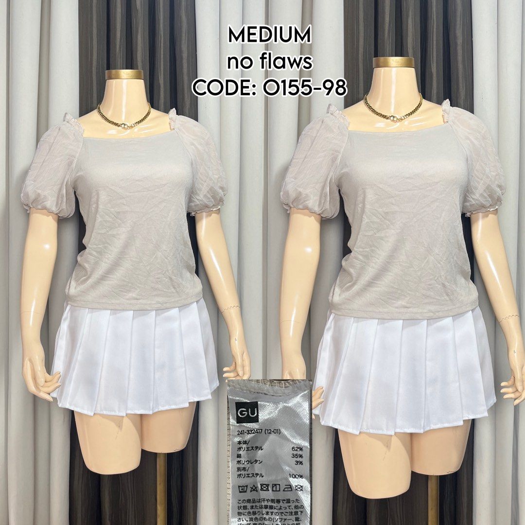 GU Puff Sleeve Square Neck Top Code O155-98 Size Medium (Category: Blouses) located in Naga. Submitted by rmapprl (Listing ID 1467124909, Image 1). Description: - Brand/Style: GU puff sleeve square neck top - Color: Light grey (versatile neutral) - Size: Medium - Details: Square neckline, sheer puffed short sleeves, ribbed body fabric - Condition: Excellent, no flaws found - Code: O155-98.