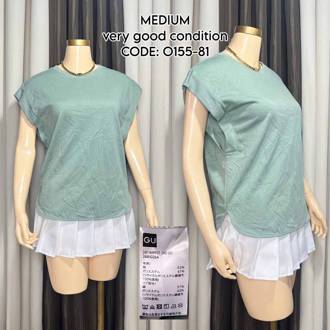 GU Sage Green Short Sleeve Top Medium Code O155-81 (Category: Shirts) located in Naga. Submitted by rmapprl (Listing ID 1467125388, Image 1). Description: - Brand: GU - Color: Sage Green - Size: Medium - Material: 53% Cotton, 47% Polyester blend - Details: Short sleeves with ribbed cuffs, crew neckline with gold-tone chain accent, and curved hem - Condition: Clean fabric, great basic piece for pairing with skirts or denim.