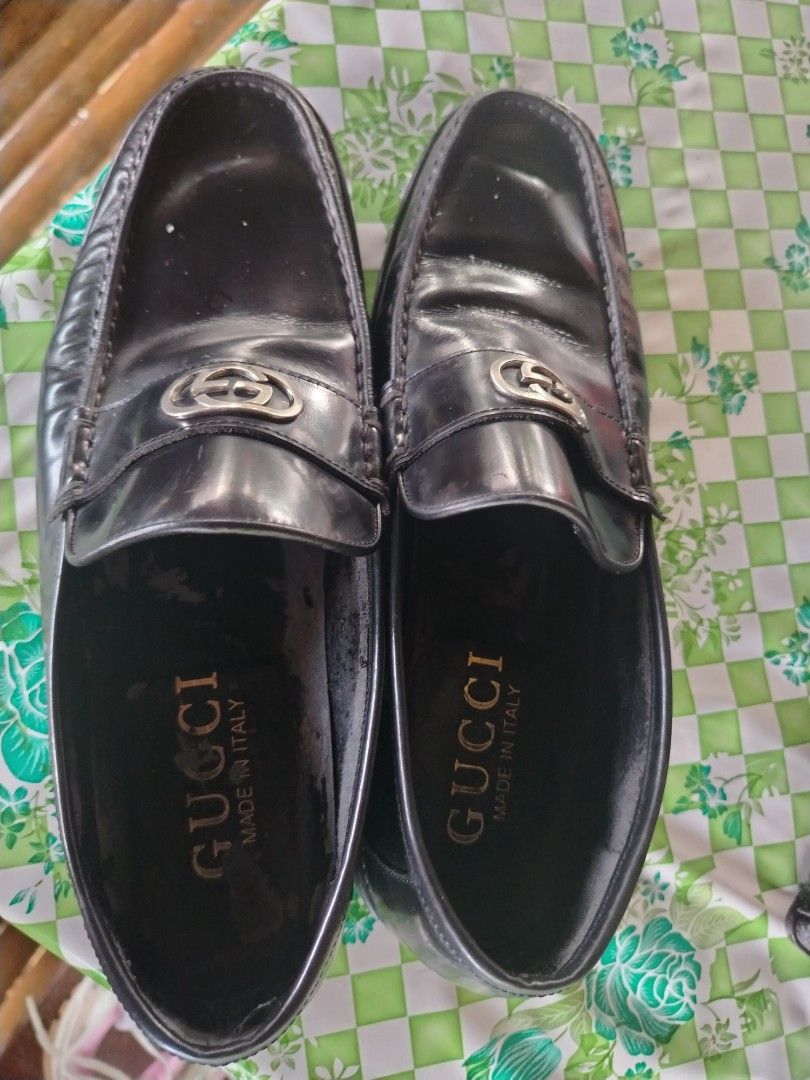 Gucci Black Leather Interlocking G Loafers (Category: Loafers) located in Dipolog. Submitted by silverocean-c236 (Listing ID 1467130237, Image 1). Description: - Brand: Gucci - Color: Black - Material: Genuine Leather - Hardware: Silver Interlocking G - Origin: Made in Italy - Style: Slip-on penny loafer, ideal for formal and business casual wear - Condition: Shows normal wear on soles and insoles.