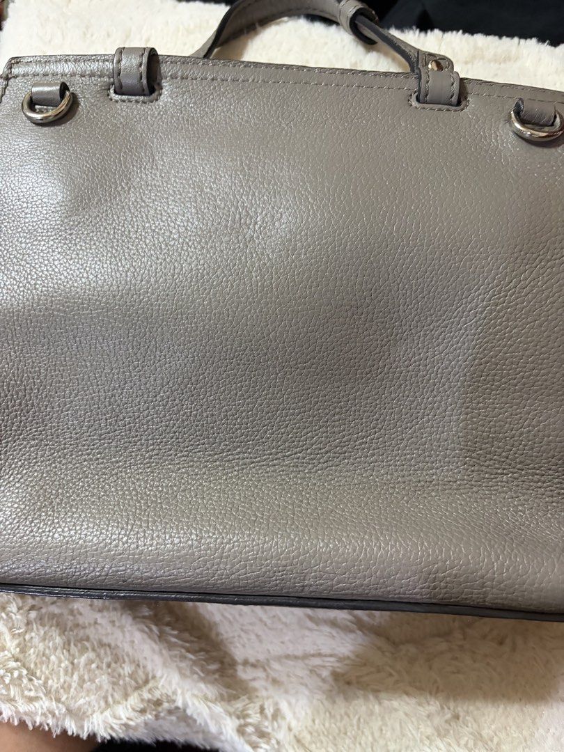 Authentic Gucci Grey Leather Bamboo Top Handle Bag (Category: Luxury Bags & Wallets) located in Manila. Submitted by lynnalec25 (Listing ID 1467146214, Image 3). Description: - Brand: Gucci - Material: Premium grey pebbled leather with silver-toned hardware - Closure: Signature bamboo turn-lock on front flap - Straps: Dual top handles and a detachable, adjustable shoulder strap - Design: Structured silhouette, clean stitching, and debossed Gucci 