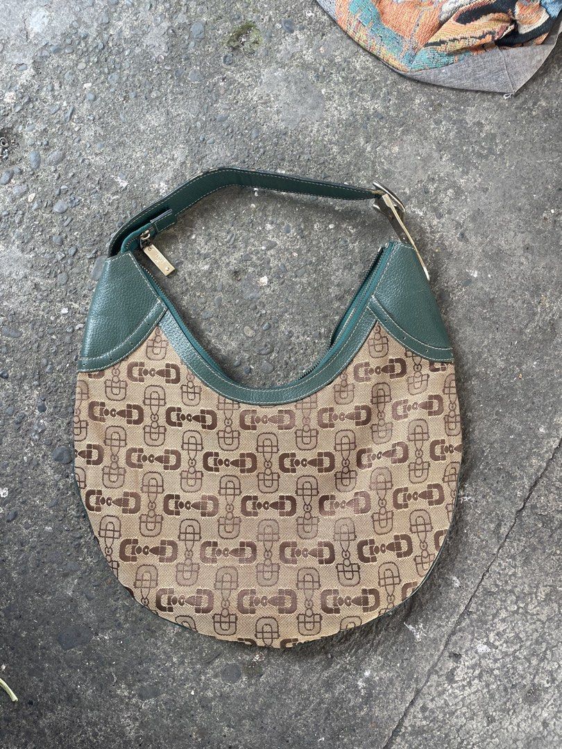 Gucci hobo bag (Category: Luxury Bags & Wallets) located in Iloilo. Submitted by sweaythrift (Listing ID 1467105568, Image 1). Description: Vintage Gucci Horsebit Glam Canvas Hobo Shoulder Bag Medium size.