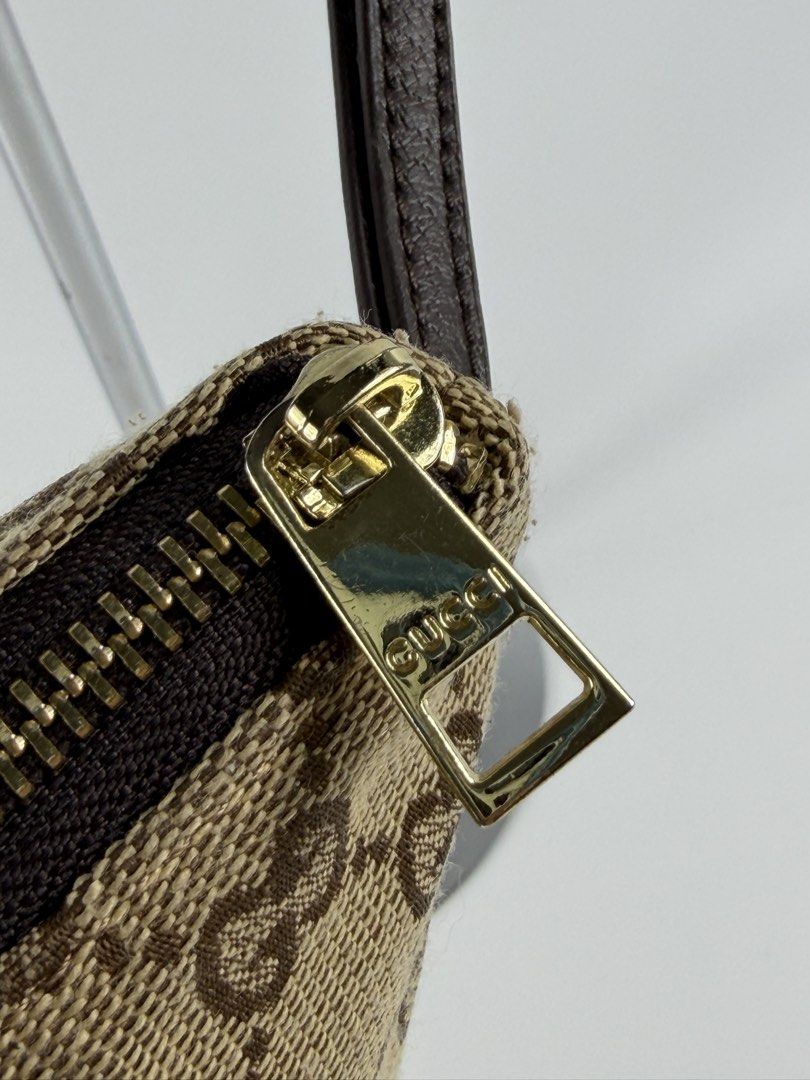 Gucci Monogram - Pouch (Category: Luxury Bags & Wallets) located in Mabalacat. Submitted by seanthep (Listing ID 1467103089, Image 3). Description: Gucci Monogram - Pouch bag Fits iPhone Pro/Pro max No rubs on monogram design Issue: Removed tag.