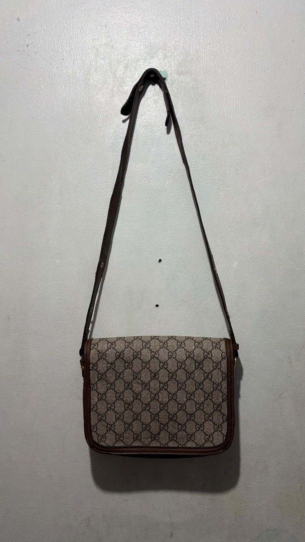 Gucci Monogram Horsebit Shoulder Bag (Category: Luxury Bags & Wallets) located in Manila. Submitted by alenoid (Listing ID 1467140301, Image 2). Description: - Gucci shoulder bag in beige/brown monogram canvas - Classic gold-tone horsebit hardware on front flap - Adjustable brown leather strap with metal snap buttons - Clean fabric lining with interior zip pocket and QR code tag - Spacious enough for daily essentials - Condition: Good, well-maint