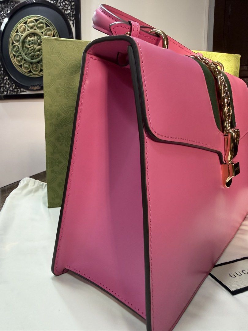 Gucci Pink Sylvie Medium Top Handle Shoulder Bag (Category: Luxury Bags & Wallets) located in Ilagan. Submitted by stargirldotph (Listing ID 1467098554, Image 3). Description: • ₱45,459 ONLY • Retail Price: $2,496 • Guaranteed Authentic • USED, but still very presentable, and ready to use. In excellent condition. • No major issues to mention. Please inspect all the photos. • Inclusions: Box, Dustbag • PM me for more inquiries WHAT YOU SEE IS WHAT