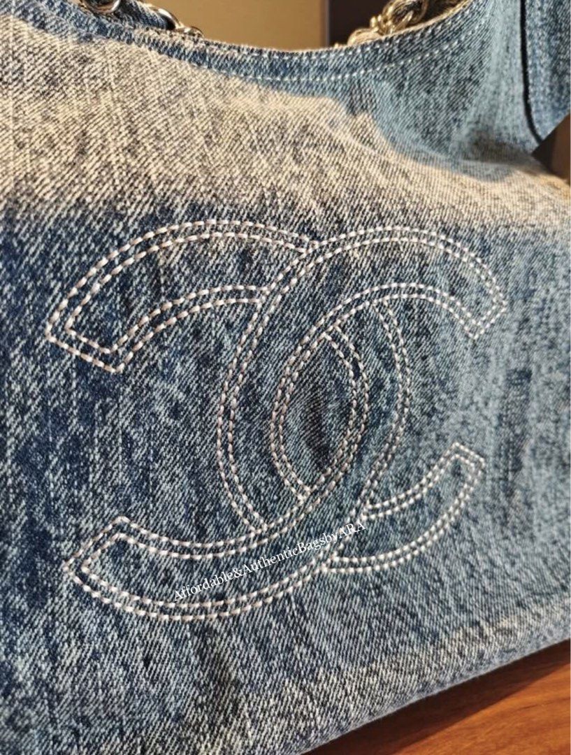 GWP CHANEL LIGHT WASHED DENIM TOTE (Category: Shoulder Bags) located in Daet. Submitted by ecassenluxuries (Listing ID 1467089984, Image 3). Description: 📌 FIXED PRICE ALREADY ✅ All items are guaranteed 💯% AUTHENTIC GWP ITEM ▫️Brand: Chanel ▫️Style: Light wash denim hobo bag ▫️Details: Large white stitched interlocking CC logo on the front ▫️Strap: Intertwined chain and denim shoulder strap with tag attached ▫️Design: Soft, slouchy structured b