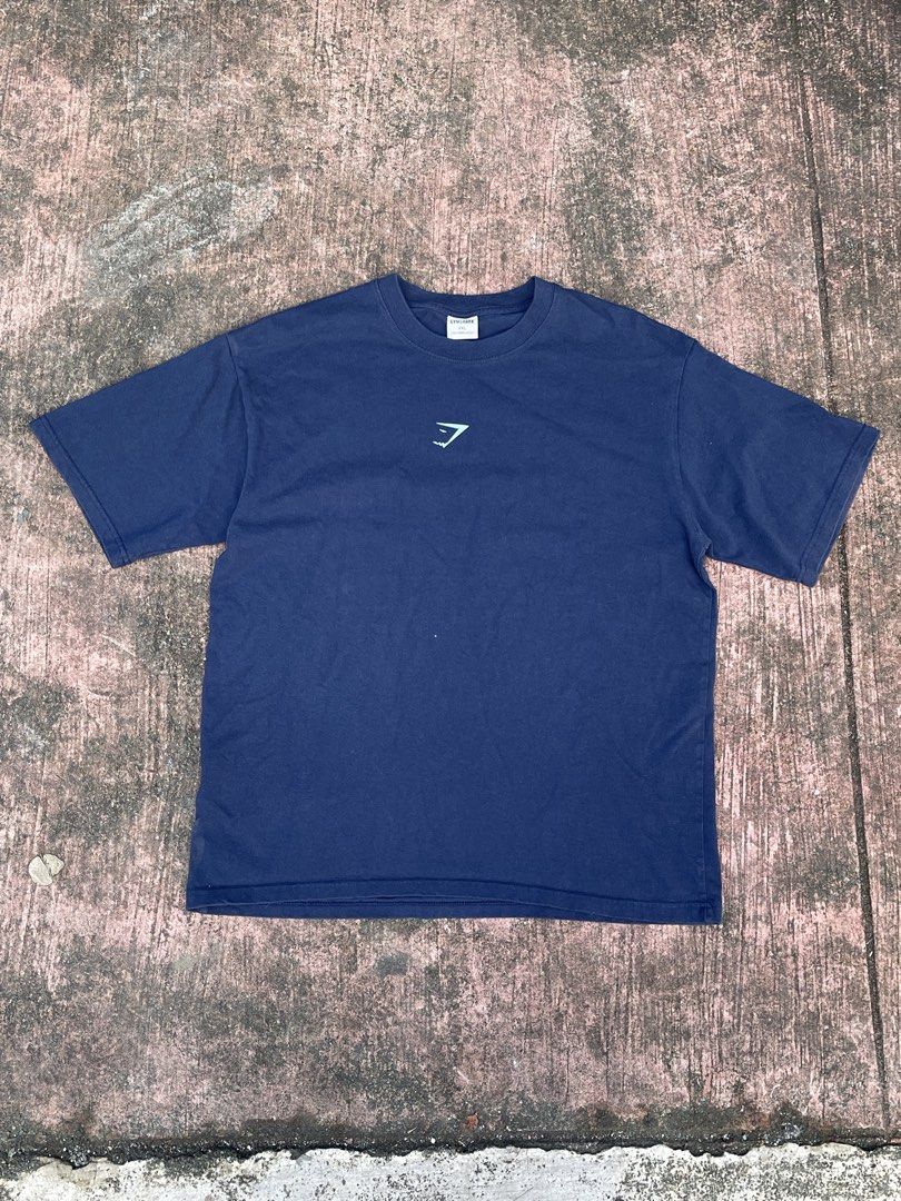 Gymshark Power Tee Navy Blue (Category: Activewear) located in Marikina City. Submitted by joshuaades21107 (Listing ID 1467066205, Image 1). Description: Gymshark Power Tee Navy blue 22 width 27 length Excellent condition .