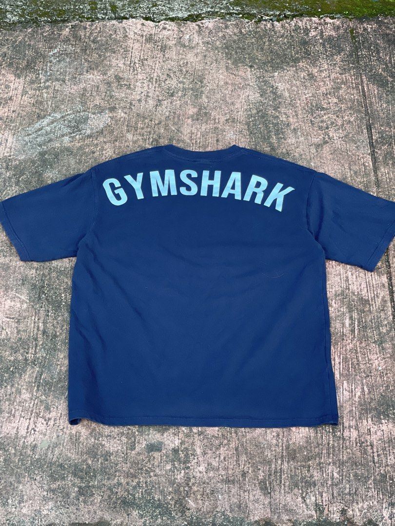 Gymshark Power Tee Navy Blue (Category: Activewear) located in Marikina City. Submitted by joshuaades21107 (Listing ID 1467066205, Image 2). Description: Gymshark Power Tee Navy blue 22 width 27 length Excellent condition .
