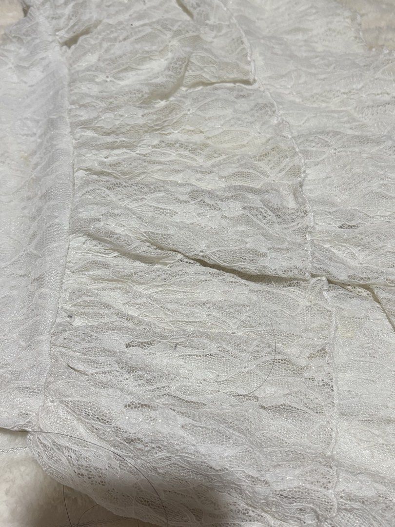 H& M White Lace Layered Ruffle Skirt (Category: Skirts) located in Quezon City. Submitted by hadescloset (Listing ID 1467057701, Image 2). Description: - Kids size but can fit XS adult - Color: White - Style: Lace mini skirt with all-over layered ruffles - Waistband: Elastic for an easy and comfortable fit - Material: Soft, textured fabric with a delicate pattern - Condition: Excellent, no flaws noticed - Perfect for: Summer outfits and casual la