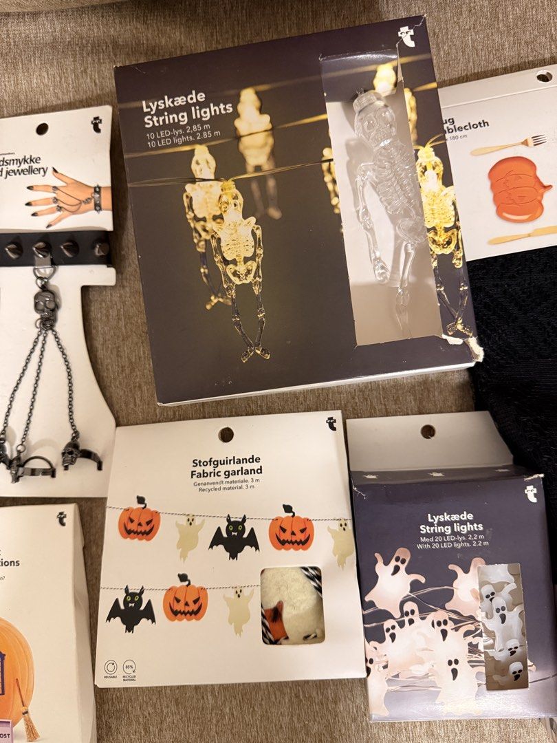 Halloween Decoration Bundle Spooky String Lights Curtains Props (Category: Occasions & Party Supplies) located in Quezon City. Submitted by reinibells (Listing ID 1467087024, Image 3). Description: Massive Halloween decor set ready for your party. Includes two packs of black mesh curtains, skeleton string lights, ghost string lights, fabric garlands, pumpkin decorations box, table cloth, a ceramic pumpkin tealight holder, two hand jewellery acces