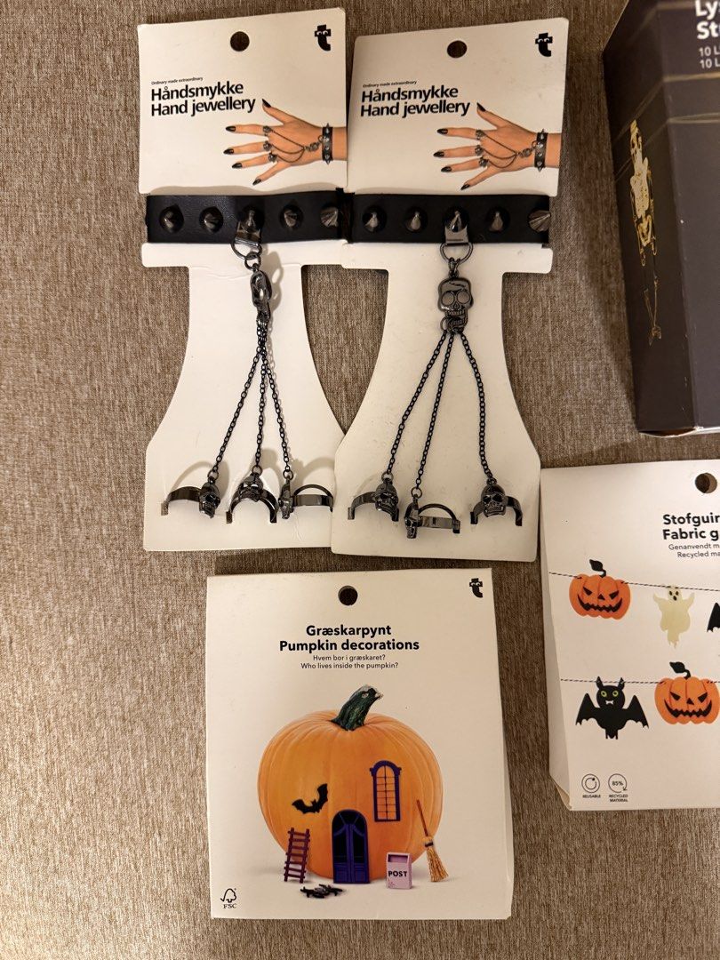 Halloween Decoration Bundle Spooky String Lights Curtains Props (Category: Occasions & Party Supplies) located in Quezon City. Submitted by reinibells (Listing ID 1467087024, Image 2). Description: Massive Halloween decor set ready for your party. Includes two packs of black mesh curtains, skeleton string lights, ghost string lights, fabric garlands, pumpkin decorations box, table cloth, a ceramic pumpkin tealight holder, two hand jewellery acces
