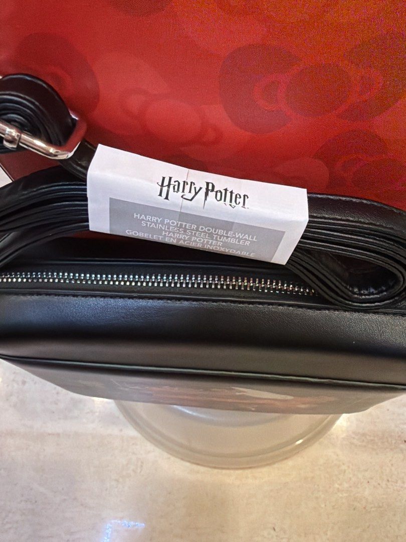 Harry Potter Black Shoulder Bag (Category: Cross-body Bags) located in Manila. Submitted by buyauthentics (Listing ID 1467024136, Image 2). Description: Harry Potter Black Shoulder Bag .