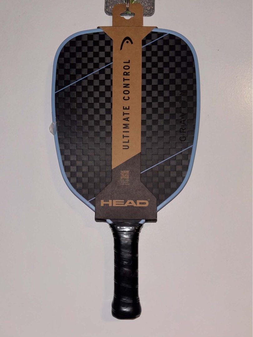 HEAD Gravity Ultimate Control Pickleball Paddle (Category: Racket and Ball Sports) located in Dasmarinas. Submitted by preloved.frommary (Listing ID 1467027196, Image 1). Description: -Bought from US - Brand new with tag, original store sticker, and retail packaging - Model: HEAD Gravity Ultimate Control - Design: Black and blue checkerboard pattern - Shape & Core: Unique sweetspot shape with a thicker core for enhanced play - Comfort: Features a