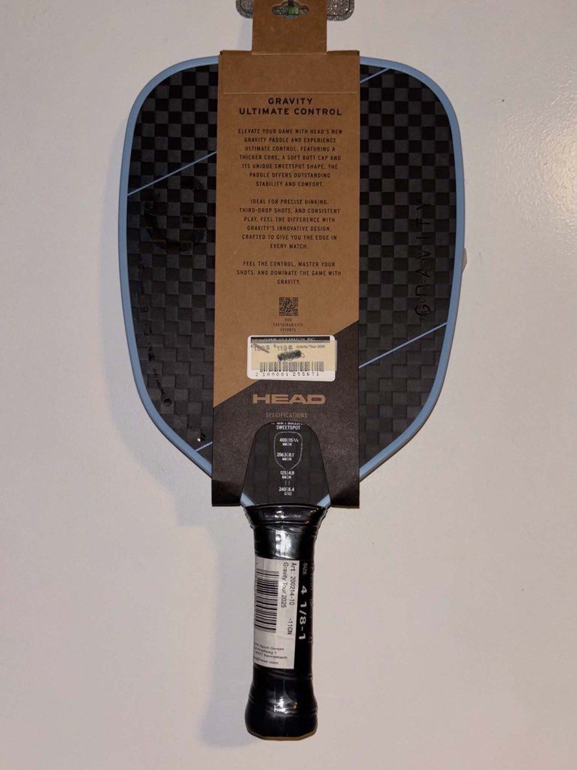 HEAD Gravity Ultimate Control Pickleball Paddle (Category: Racket and Ball Sports) located in Dasmarinas. Submitted by preloved.frommary (Listing ID 1467027196, Image 2). Description: -Bought from US - Brand new with tag, original store sticker, and retail packaging - Model: HEAD Gravity Ultimate Control - Design: Black and blue checkerboard pattern - Shape & Core: Unique sweetspot shape with a thicker core for enhanced play - Comfort: Features a