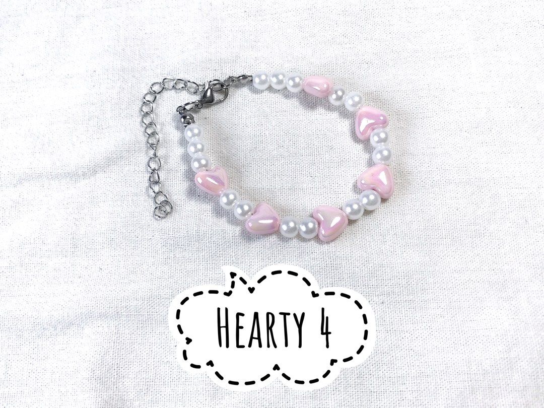 Hearty Heart Pearl Beaded Bracelets (Category: Bracelets) located in Cavite. Submitted by cjdartisan (Listing ID 1466980827, Image 3). Description: Here at CJD Artisan we lovingly hand make small batches of unique flower beaded bracelets that will ensure you stand out from the crowd. Materials seed beads stainless steel metal findings Size 6 inches WRIST SIZE with 1 inches extension chain Add a touch of floral charm to your everyday look with thi