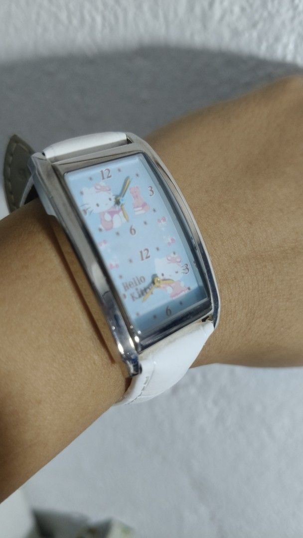 Hello Kitty Dial Dual Time Silver tone Rectangle White Ladies Strap (Category: Women's Watches) located in Taguig. Submitted by mercyeugen28914 (Listing ID 1467025846, Image 2). Description: Preloved Japan Watch hello Kitty Dial Dual Time Silver tone rectangular shape white Strap stainless steel back .