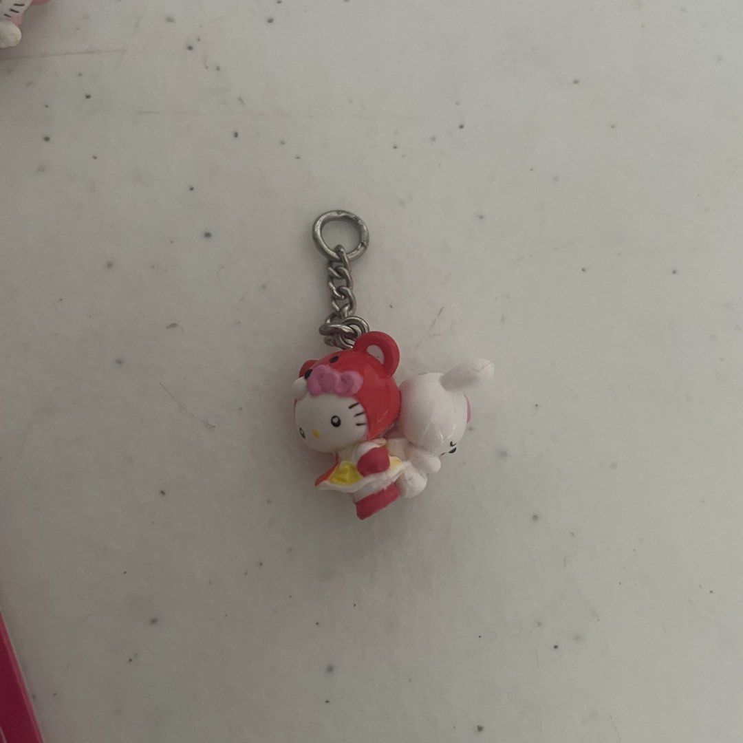 hello kitty gotochi keychain (Category: Character Goods) located in Iloilo. Submitted by snrlvr_ (Listing ID 1467039766, Image 3). Description: - Set of 4 adorable Sanrio Kitty charms - Sold as a bundle set.