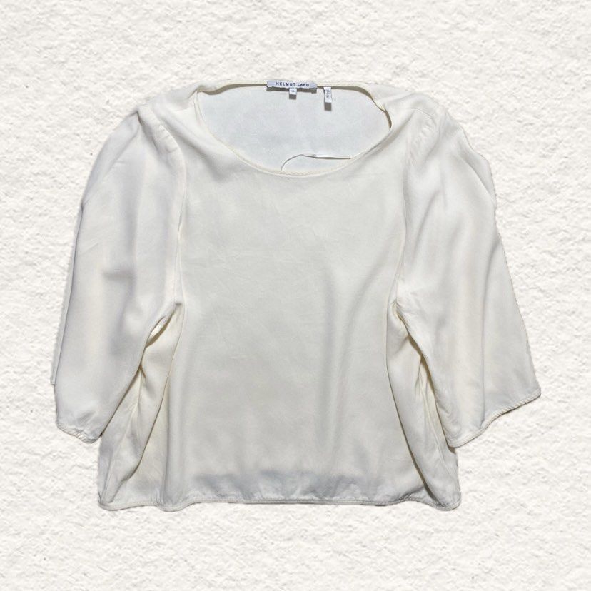 Helmut Lang White Blouse Top (Category: Blouses) located in Nasipit. Submitted by yopey (Listing ID 1467018698, Image 1). Description: Helmut Lang White Cream Viscose Acetate Blouse Top Dimes: 19x20 Condition: Pristine Price: 550 shipped.