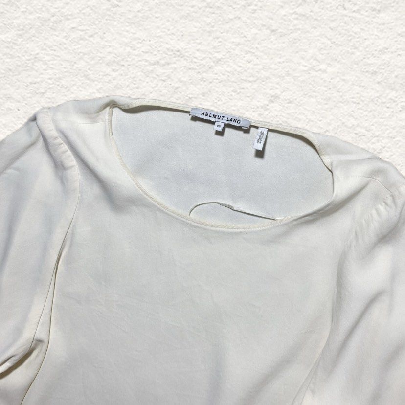 Helmut Lang White Blouse Top (Category: Blouses) located in Nasipit. Submitted by yopey (Listing ID 1467018698, Image 2). Description: Helmut Lang White Cream Viscose Acetate Blouse Top Dimes: 19x20 Condition: Pristine Price: 550 shipped.