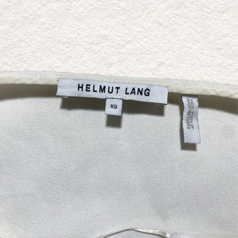 Helmut Lang White Blouse Top (Category: Blouses) located in Nasipit. Submitted by yopey (Listing ID 1467018698, Image 3). Description: Helmut Lang White Cream Viscose Acetate Blouse Top Dimes: 19x20 Condition: Pristine Price: 550 shipped.