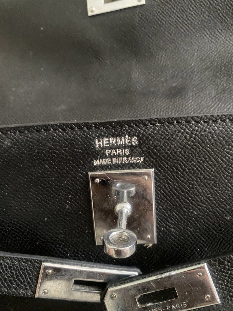Hermes Kelly Black Leather Handbag (Category: Luxury Bags & Wallets) located in Tarlac. Submitted by cheap.fleaaa (Listing ID 1466979340, Image 2). Description: Hermes kelly✨ Need clean sa loob 3,000 + ship Any courier Tarlac based📍.