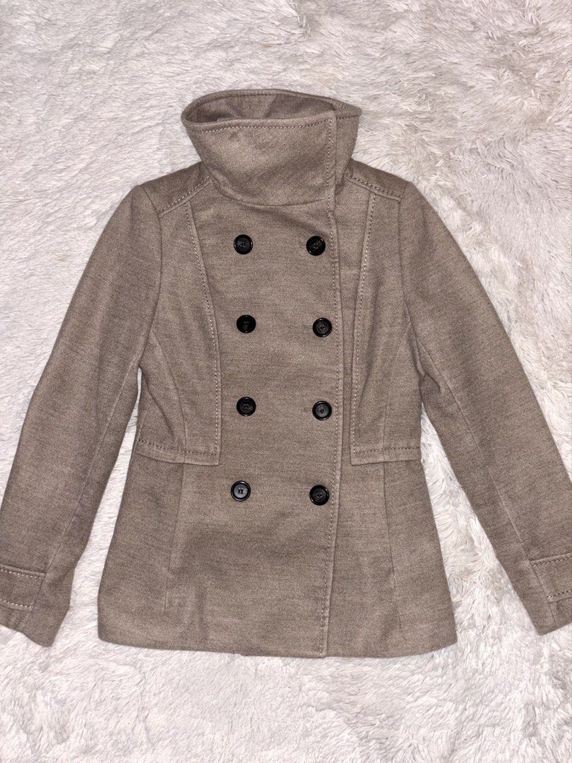 H&M Beige Funnel Neck Double-Breasted Winter Coat (Category: Coats, Jackets and Outerwear) located in Bulacan. Submitted by rin2024 (Listing ID 1467052171, Image 1). Description: H&M Beige Funnel Neck Double-Breasted Winter Coat - With 2 front pockets - With secure buttons on body and neck - With warm fabric - With extra buttons - Fits sizes XS to S only, with snug fit on size S - With signs of use on one button - Also bought from Carousell Payme