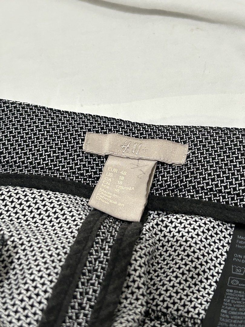 H&M+ Black & White Patterned Plus Size Pants EUR 48 US 18 (Category: Jeans) located in Quezon City. Submitted by jilamndz (Listing ID 1467064108, Image 2). Description: - Brand: H&M+ - Design: Black and white patterned weave - Fit: Mid-rise with a comfortable structured waistband - Cut: Tailored lines, standard ankle-length - Size: EUR 48 / US 18 / CA 18 / CN 175/96A - Origin: Made in China.