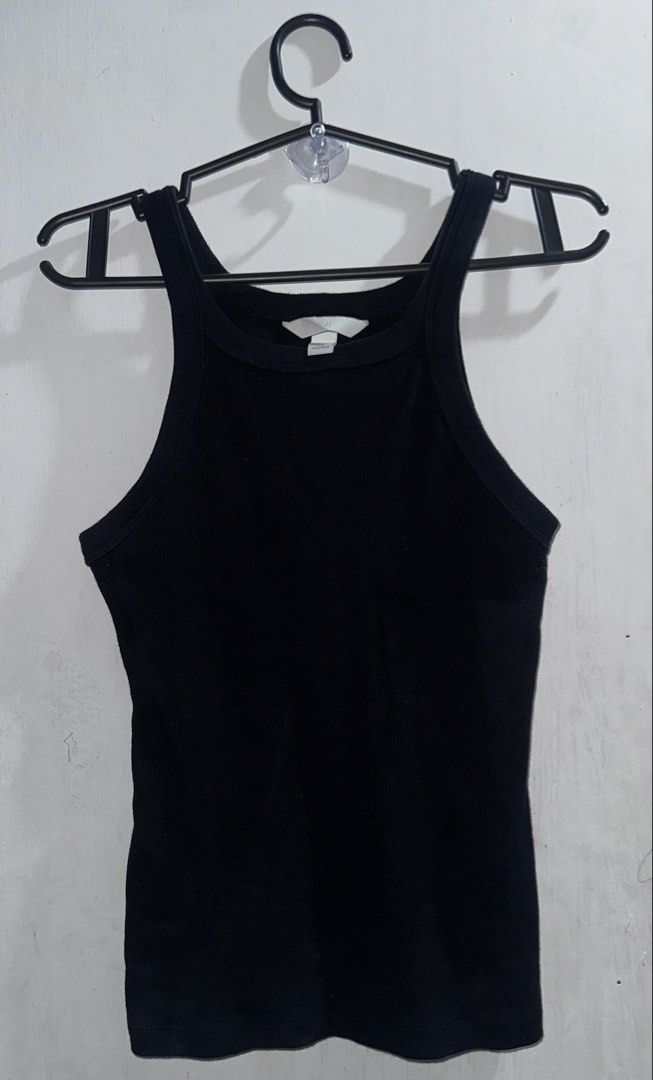 H&M black ribbed tank top (Category: Sleeveless) located in Cavite. Submitted by chicfinds.slay (Listing ID 1467155961, Image 1). Description: Used once only No flaws Good as new/jetblack color no fadings.