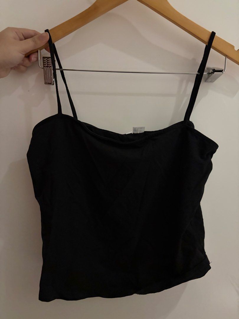 H&M Black Top L (Category: Sleeveless) located in Las Pinas. Submitted by sc.moo04 (Listing ID 1467162617, Image 1). Description: - Brand: H&M Divided - Item: Black camisole top - Size: EUR L / UK L / CN 175/104A - Design: Thin spaghetti straps with a straight square neckline - Condition: Brand new with original paper tags attached, never used - Style: Versatile basic wardrobe essential, easy to mix and match.