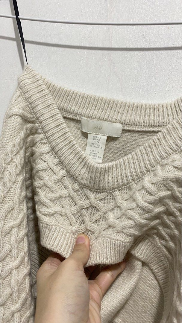 H&M Cream Cable Knit Sweater Size XS (Category: Longsleeves) located in Ozamiz City. Submitted by carisclosetcleanup (Listing ID 1467123695, Image 3). Description: - Brand: H&M - Color: Cream - Size: XS - Pattern: Classic all-over cable knit - Details: Ribbed collar, cuffs, and hem - Condition: Clean, tag intact - Features: Warm fabric texture, perfect layering piece for cooler weather.