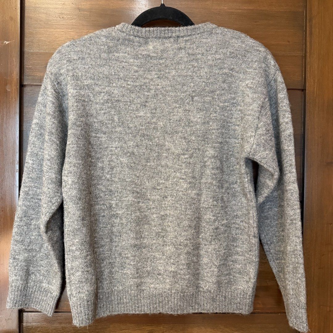 H&M Disney sweater (Category: Babies & Kids Fashion) located in Quezon City. Submitted by ksdong (Listing ID 1467009885, Image 2). Description: - Brand: H&M x Disney (Mickey Mouse collaboration) - Condition: Brand new with original retail tag (1,490 PHP) - Size: EUR 134/140, UK 8-10Y - Design: Large Mickey Mouse graphic in black, white, and red on grey knit - Details: Ribbed crew neck, cuffs, and hem - Material: Warm and cozy fabric, great for da