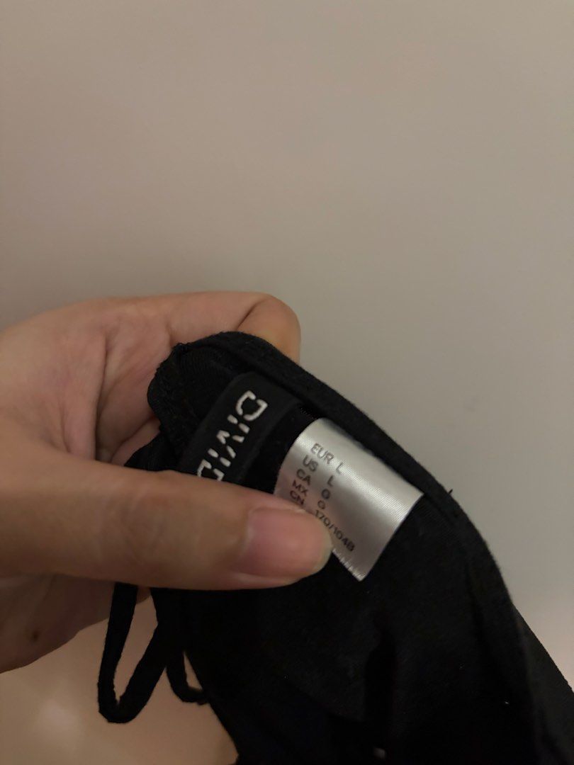 H&M DIVIDED Black Ruffle Strap Crop Top Size L (Category: Sleeveless) located in Las Pinas. Submitted by sc.moo04 (Listing ID 1467162598, Image 2). Description: - Brand: H&M Divided - Size: L - Color: Black - Style: Sleeveless, plunging V-neck, cropped length - Details: Ruffles on straps and tie-string neckline - Condition: Great, clean condition - Perfect for easy daily outfits and casual styling.
