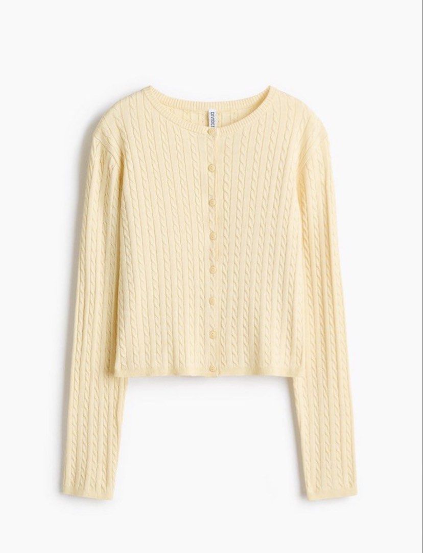 H&M Divided Yellow Cable Knit Button Cardigan (Category: Coats, Jackets and Outerwear) located in Manila. Submitted by hiddentreasureph (Listing ID 1467078910, Image 1). Description: Light yellow cable knit cardigan from H&M Divided. Round neckline with front button closure down the middle. Long sleeves and ribbed hem. All-over vertical cable knit pattern. Soft knit fabric. Great layering piece for cooler weather or air-conditioned rooms..