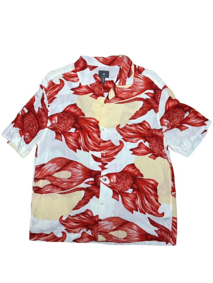 H&M Hawaiian Red Betta fish Button down Polo Shirt (Category: Tshirts & Polo Shirts ) located in Marikina City. Submitted by maobuysstuff (Listing ID 1467013408, Image 1). Description: H&M Hawaiian Red Betta fish Button down Polo Shirt - Style: Short sleeve button-down shirt - Design: White background with vibrant red betta fish print and soft yellow circles - Lightweight fabric ideal for warm weather - 20" x 26" (front), 28" (back).