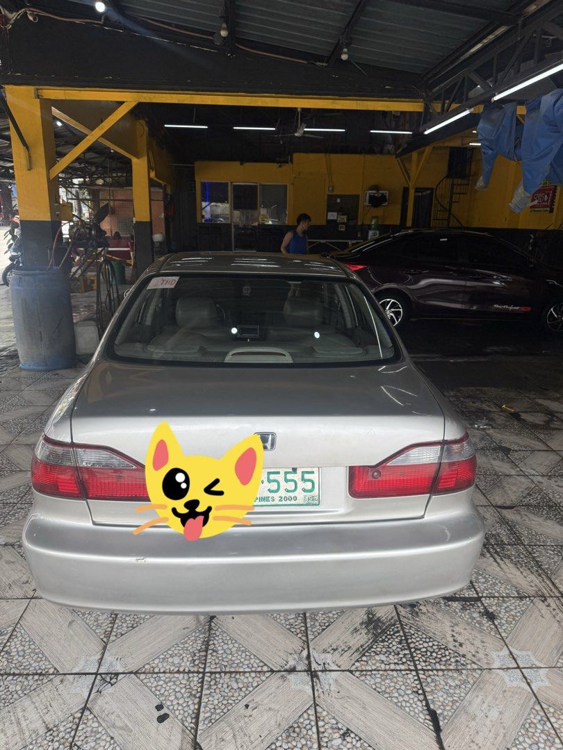 Honda Accord 2.0 i-VTEC (A) (Category: Used Cars) located in Manila. Submitted by dpaalisbo (Listing ID 1467163896, Image 2). Description: FOR SALE!!! Honda accord 2.0 1999 model Gas Automatic transmission Newly registered orig OR (2027 expired) Orig cr Local made Special plate "555" With conduction sticker (almost fade) Good running condtion (daily use) All lights working New door handle 4 sides No tint Newly change oil New timing belt Newly pai