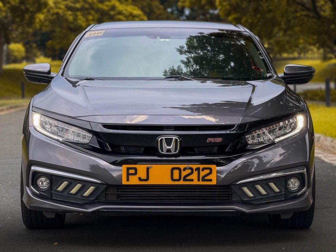 Honda Civic RS Turbo Auto (Category: Used Cars) located in Manila. Submitted by quality_cars (Listing ID 1467078496, Image 1). Description: HONDA CIVIC RS TURBO MMC FOR SALE / SWAP / FINANCING 👍🏼 Year Model: 2020 Color: Moder Steel Metallic (All Orig Paint) Engine: 1.5-liter Turbo Charged Transmission: 8-Speed CVT Mileage: 50,000 (Untampered) Plate Ending: 4 Details: Newly Ceramic Coated 18s Rays TE37 Wheels Ceramic Window Tint Window Visors Ke