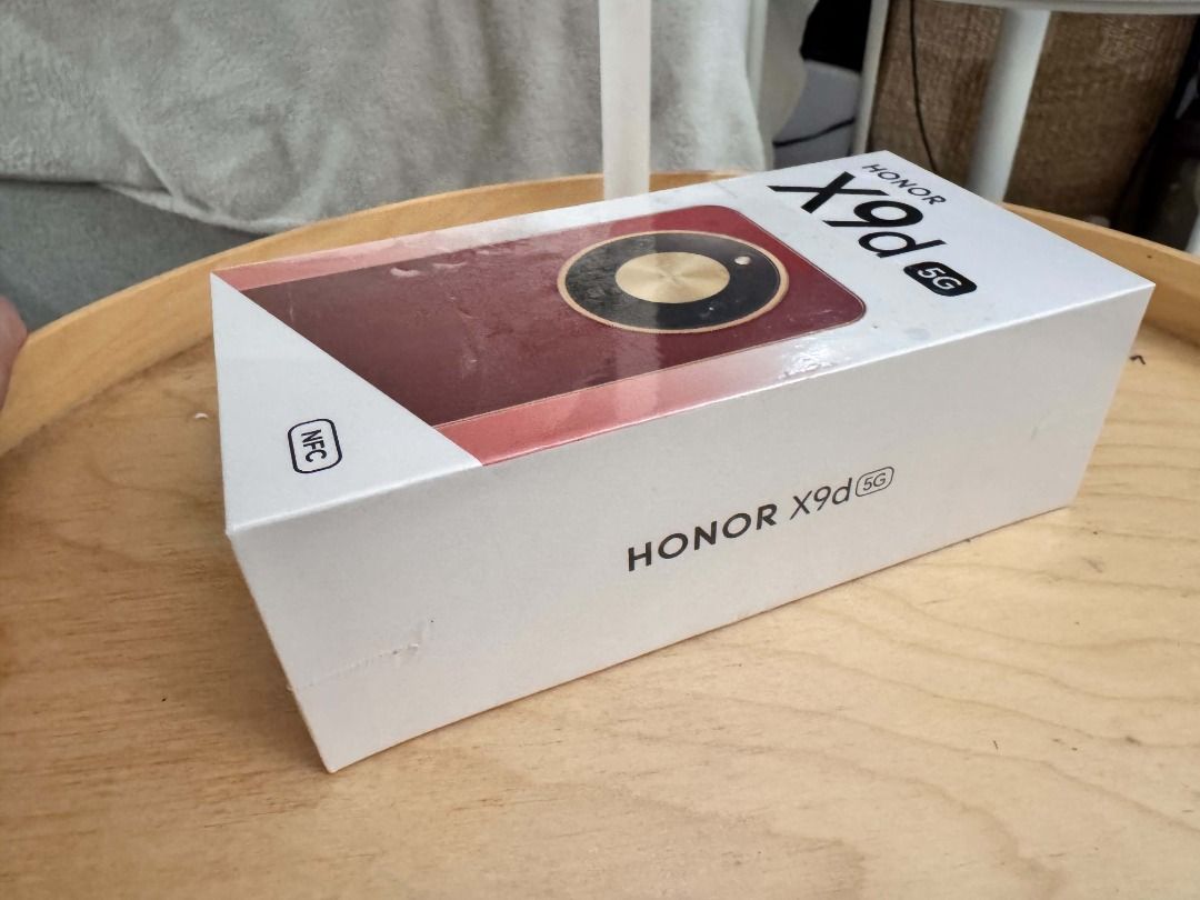 Honor X9D bnew (Category: Android Others) located in Caloocan City. Submitted by mjting01 (Listing ID 1467104648, Image 3). Description: - Brand new, factory-sealed Honor X9D 5G smartphone - Comes in original retail box with intact plastic seal - Features stylish red design with circular gold camera module - Equipped with 5G and NFC capabilities - Perfect pristine condition, ready for new owner.