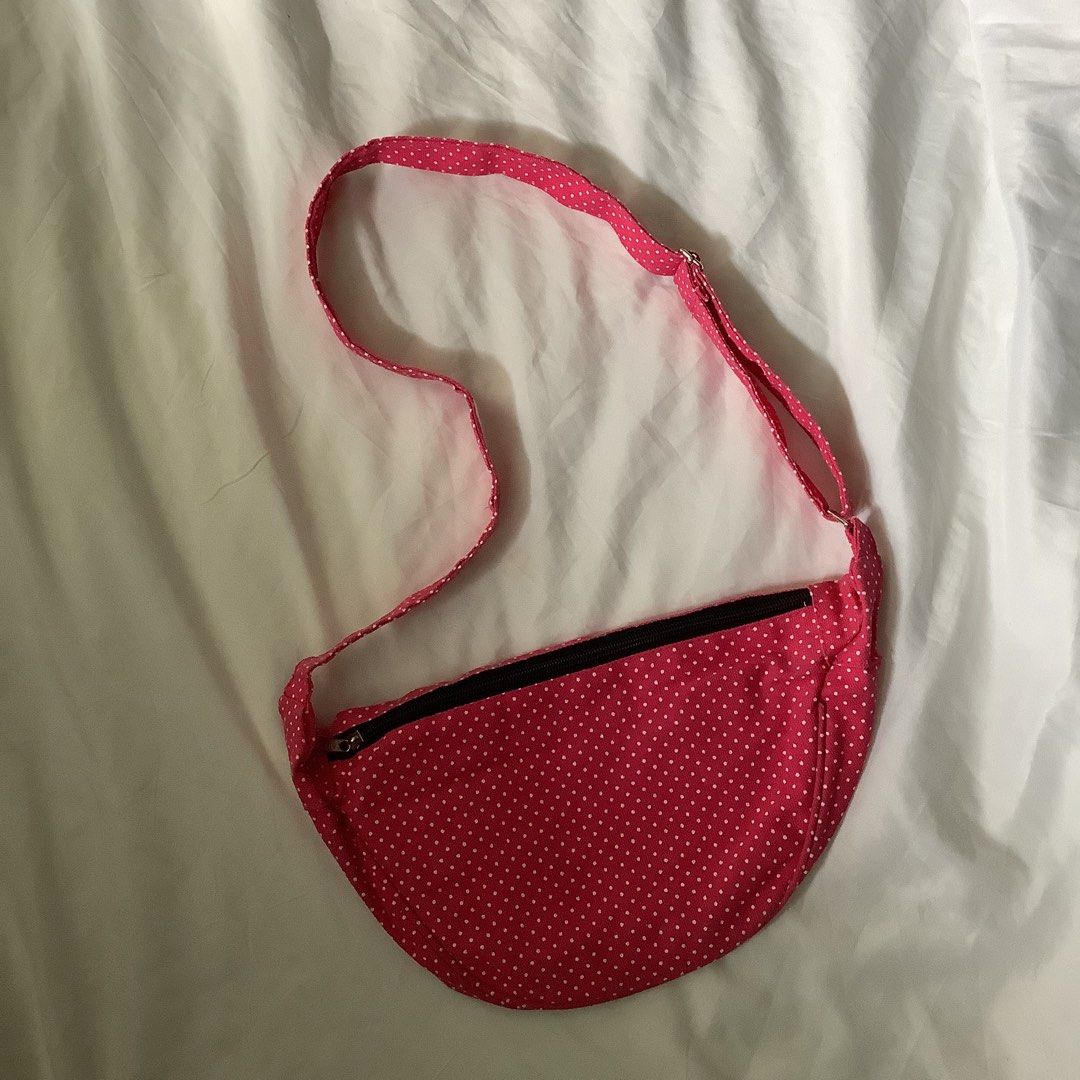 Hot Pink Polkadots Dumpling Sling Bag (Category: Cross-body Bags) located in Cavite. Submitted by kbyshe_catalog (Listing ID 1467102870, Image 1). Description: brand new spacious (with compartment inside) adjustable straps .