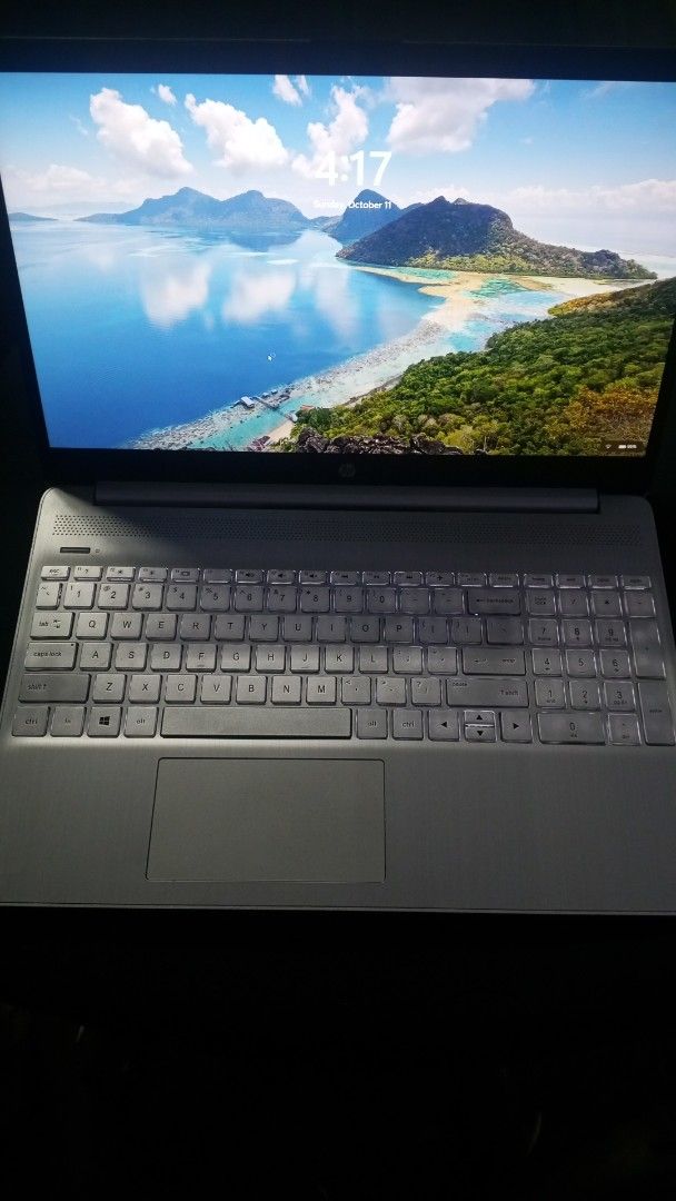 HP Silver Laptop with Charger and Logitech Mouse (Category: Laptops & Notebooks) located in Manila. Submitted by mikooo03 (Listing ID 1467163753, Image 2). Description: - Model: Silver HP Laptop running Windows 11 - Condition: Clean screen and body, well-maintained - Keyboard: Full layout complete with a number pad - Battery & Power: Battery holds a good charge; original power adapter included - Freebie Bundle: Comes with a sleek black Logitech w