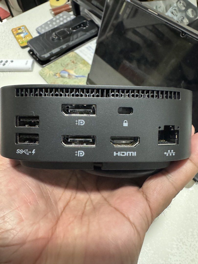 HP USB-C Dock G5 (Category: Cables & Adaptors) located in Cavite. Submitted by marcuz1316 (Listing ID 1467112259, Image 2). Description: - Genuine HP USB-C Dock G5 (Model: HSN-IX02) - Sleek black finish with silver HP logo - Multiple ports: HDMI, DisplayPort, Ethernet, and USB - Convenient integrated power button on top - Comes with attached cable for easy plug-and-play setup - Perfect for WFH setups or expanding laptop connectivity.