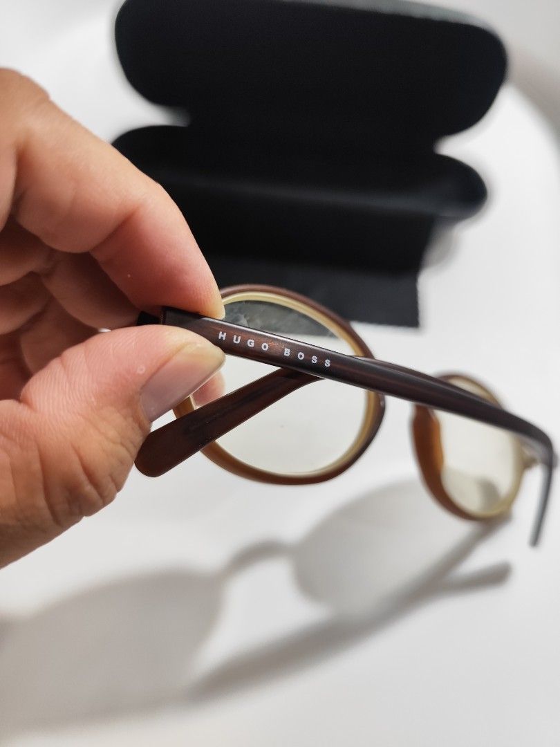 Hugo Boss Frame (Category: Sunglasses & Eyewear) located in Cebu City. Submitted by icoolectnsellect (Listing ID 1467147965, Image 3). Description: Issue: Minor Scratch, Dirt and RX lens. Bought at Garage Sale. Authenticity not Guaranteed, di ko alam if legit or Fake. Buy @ your own Risk. All EyeGlasses or Sun Glasses ay may Grado or Prescription Glasses. Please be careful para di masira mata nyo, you can change the lens and frame na lng kunin. N