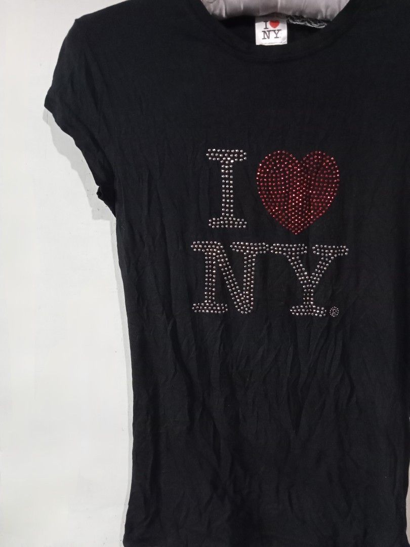 I Love NY Rhinestones Top (Category: Shirts) located in Manila. Submitted by xtycalz (Listing ID 1467065340, Image 2). Description: I ❤️ NYC mine : 200 au details size : small to semi med (slight stretchy) complete rhinestones brand : i ❤️ nyc (official licensed product) — hand wash lang yata ito guys, di pwedeng i-washing machine — no cancellation, no bogus miners — can do cod for sf only, still pay first for the item — read shop rules before pu
