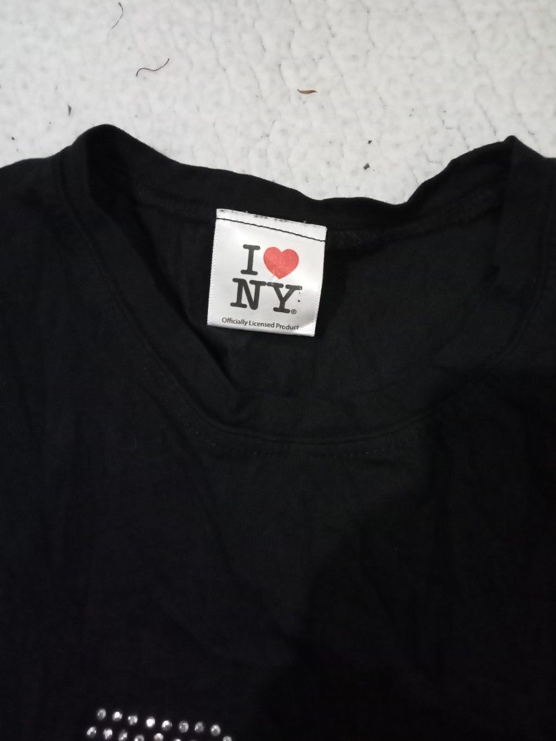 I Love NY Rhinestones Top (Category: Shirts) located in Manila. Submitted by xtycalz (Listing ID 1467065340, Image 3). Description: I ❤️ NYC mine : 200 au details size : small to semi med (slight stretchy) complete rhinestones brand : i ❤️ nyc (official licensed product) — hand wash lang yata ito guys, di pwedeng i-washing machine — no cancellation, no bogus miners — can do cod for sf only, still pay first for the item — read shop rules before pu