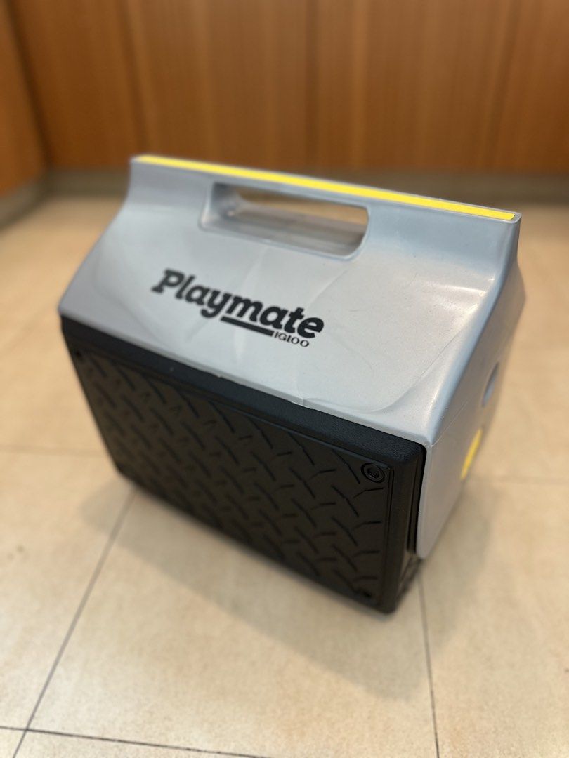 Igloo Playmate Cooler (Category: Hiking & Camping) located in Singapore. Submitted by sarahlovestea (Listing ID 1467006235, Image 1). Description: - Model: Igloo Playmate cooler - Color/Design: Silver and black with diamond plate texture - Condition: Impeccably clean inside and out - Lid: Push-button design that opens to both sides - Handle: Sturdy built-in top handle for easy carrying.