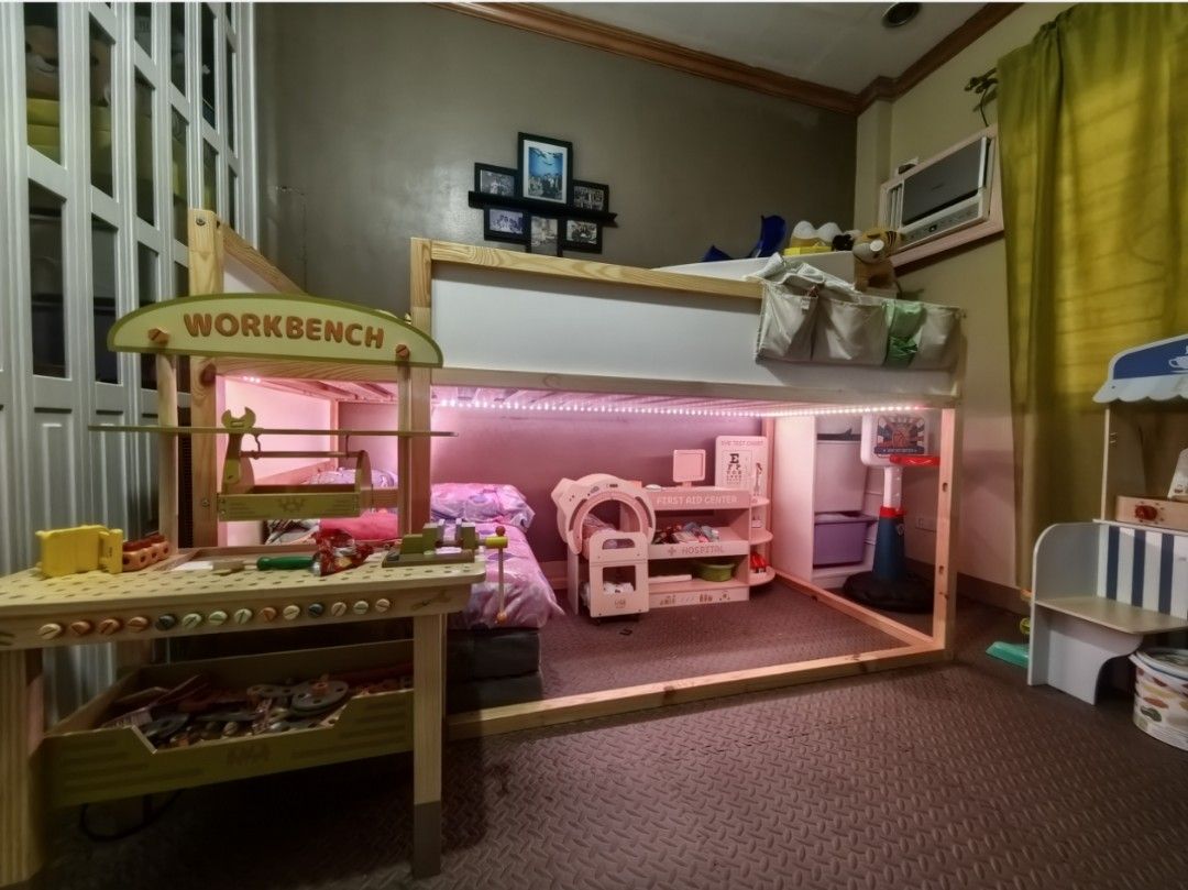 IKEA KURA Reversible Bed (Category: Bed Frames & Mattresses) located in Paranaque City. Submitted by emmafashionera (Listing ID 1467085947, Image 1). Description: - Item: IKEA KURA Reversible Bed - Color/Material: White and Pine, Solid Wood Frame - Size: 90x200 cm - Setup: Currently configured as a loft bed with a cozy play den underneath - Perks: Excellent space saver for kids' rooms, mattress NOT included! - Note: Buyer must handle the dismantl