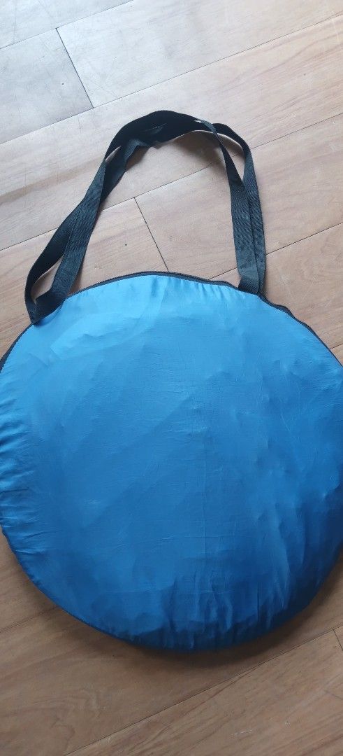 Imported From Japan Pop-Up Sunshade Tent (Category: Outdoor Furniture) located in Valenzuela. Submitted by gracebacot17959 (Listing ID 1467096362, Image 2). Description: - Authentic Japan-imported pop-up sunshade tent in vibrant blue - Instant automatic setup with a spacious interior and wide front opening - Folds flat easily into a matching round carrying bag with straps - Lightweight and highly portable for effortless travel - Ideal for beach t