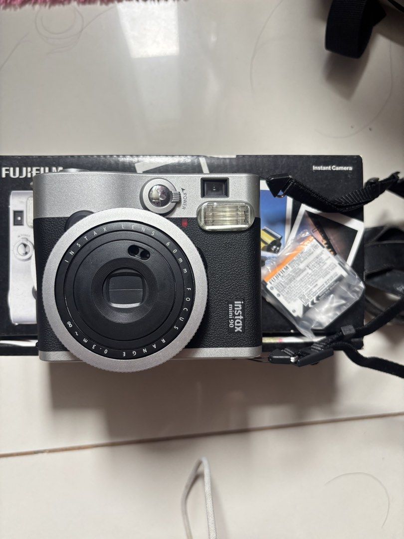 Instax Mini 90 (Category: Other Gadgets) located in Manila. Submitted by happyhorse-e04c (Listing ID 1466989286, Image 1). Description: Hi. Im selling my instax mini 90. I havent used it in a while and after I bought it I just used it once. I lost the charger unfortunately but the camera includes its battery..