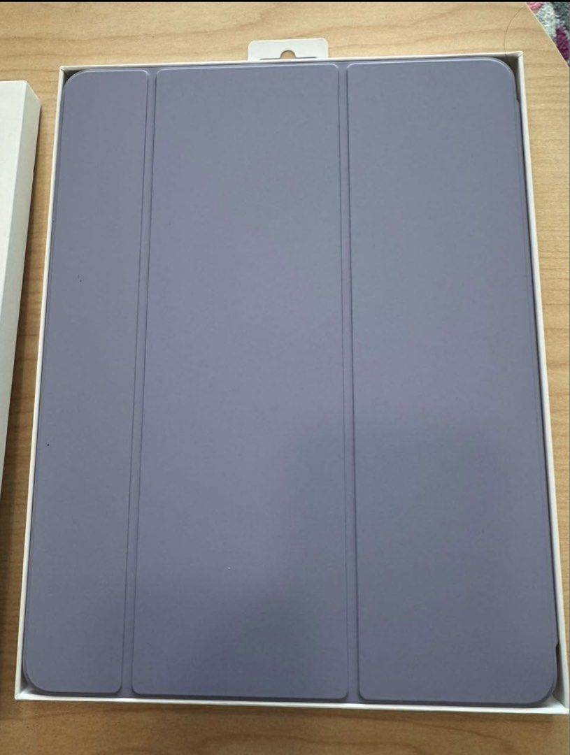 iPad (Category: Cases & Sleeves) located in Singapore. Submitted by silentwater.35e9d7 (Listing ID 1467034689, Image 3). Description: Genuine Apple Smart Folio for the 13-inch iPad Air. Brand new — only opened to check the contents, never actually used or fitted to an iPad. Comes with the original box. Thin, light cover that protects the front and back of your iPad Air. Folds into different positions for typing or watching, attaches magnetically,