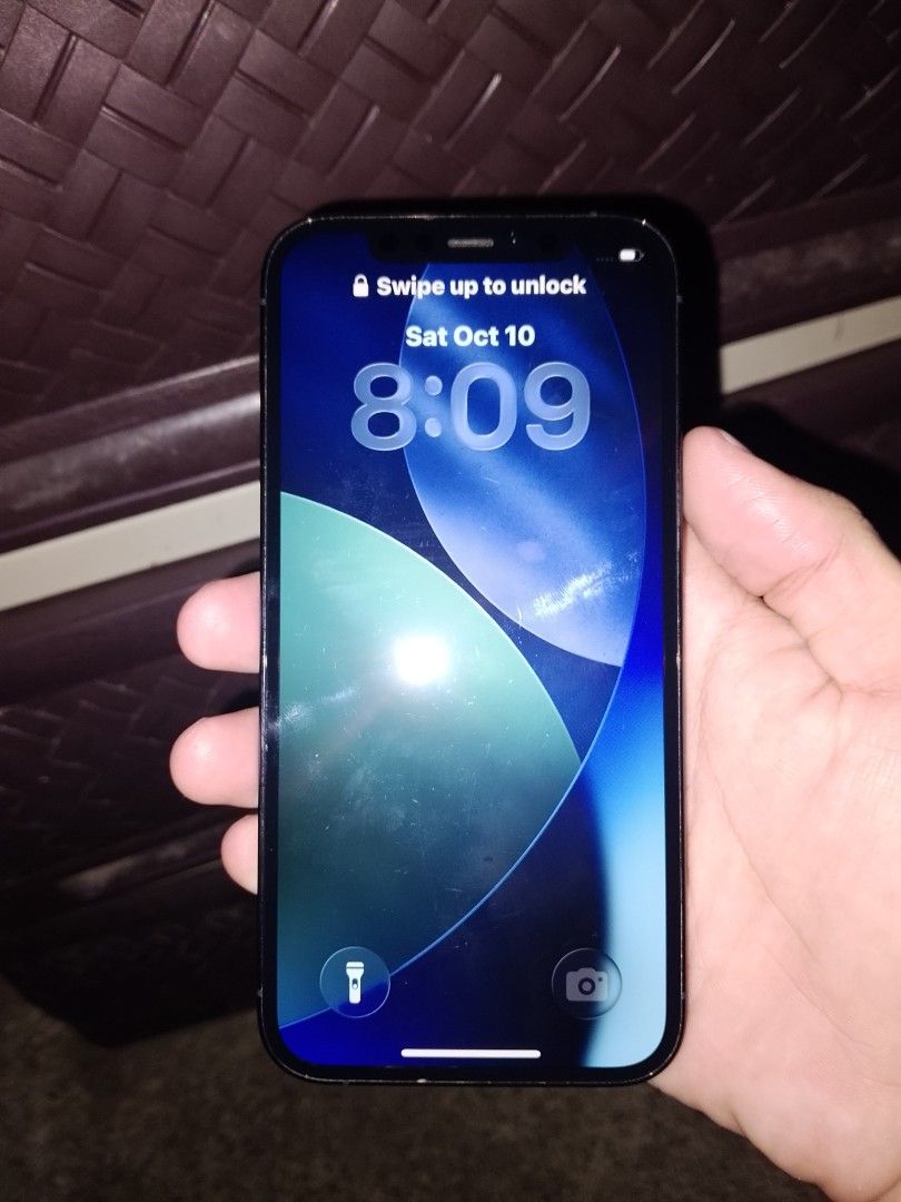IPHONE 12 PRO 128GB 74% BH (Category: iPhone 12 Series) located in Caloocan City. Submitted by kristanzzzx (Listing ID 1467138962, Image 2). Description: iPhone 12 Pro 128GB — All Original, Never Opened — ₱14,499 NEGOTIABLE Openline / No SIM restriction Face ID & True Tone working 74% Battery Health — original stock battery No iCloud lock; reset anytime Very clean, presentable unit Includes: unit, charging cable, original Apple 20W charger, premi